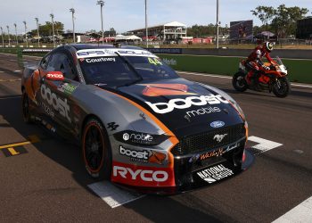 James Courtney's Ford Mustang pictured at the 2021 Darwin Triple Crown at Hidden Valley Raceway alongside a Superbike.