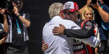 Tim Slade cops a hug from Supercars CEO Shane Howard. Image: InSyde Media