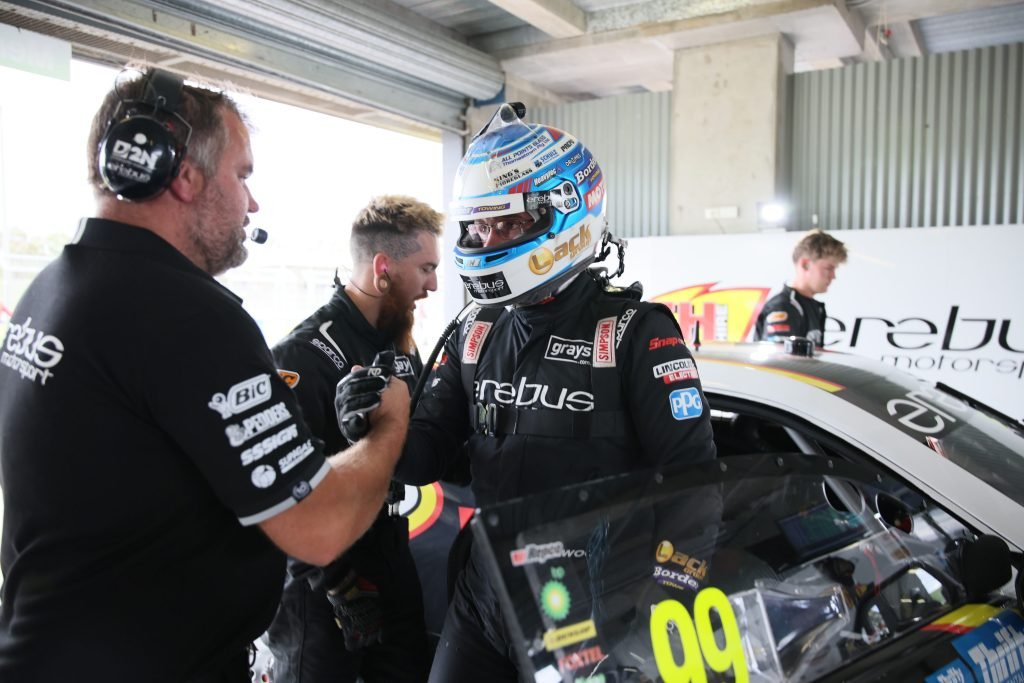 Todd Hazelwood is greeted by engineer George Commins after practice at Mount Panorama. Image: Supplied