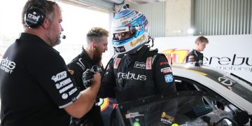Todd Hazlewood is greeted by engineer George Commins after practice at Mount Panorama. Image: Supplied