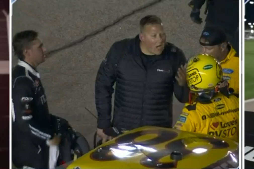 A ThorSport Racing crew member steps in to have his own words to Layne Riggs after he vented his anger at Cam Waters. Image: Fox Sports