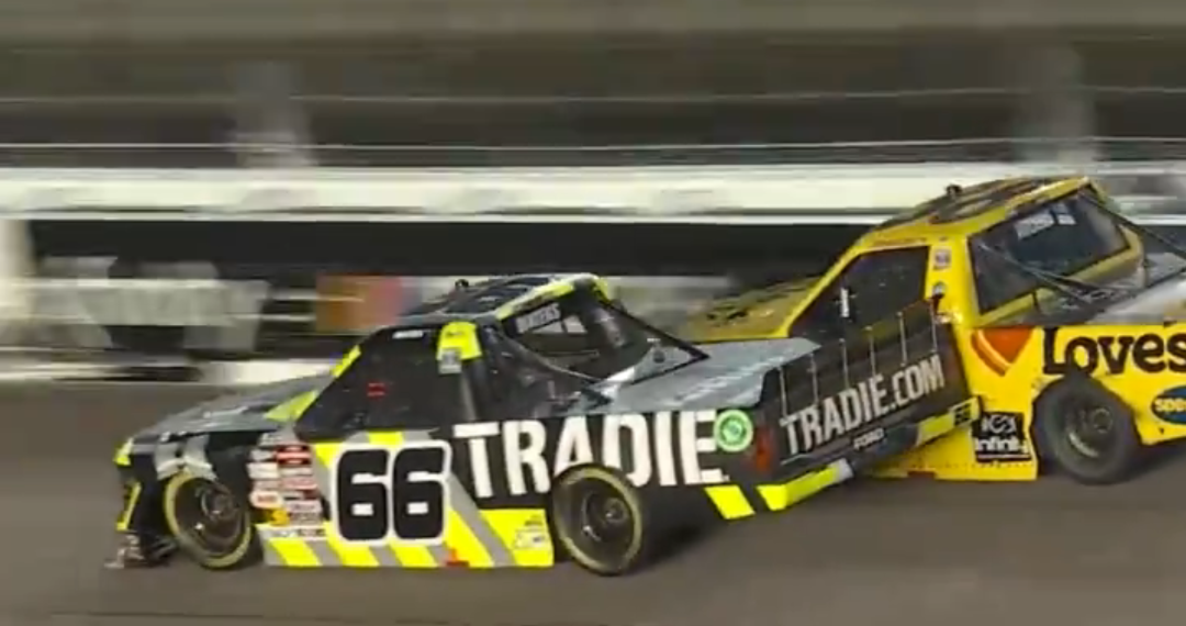 Cam Waters (#66) and Layne Riggs (#38) make contact on the final lap of the Kansas NASCAR Truck Series race. Image: NASCAR