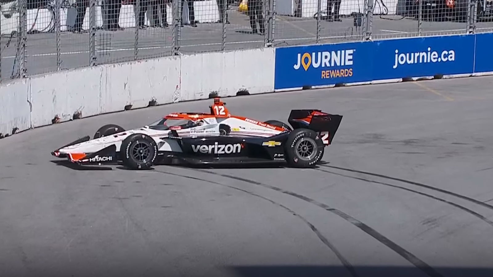 Will Power spins in practice on the streets of Toronto.