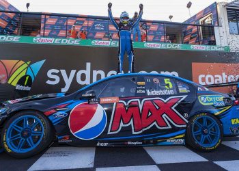 Mark Winterbottom celebrates his 2015 title.