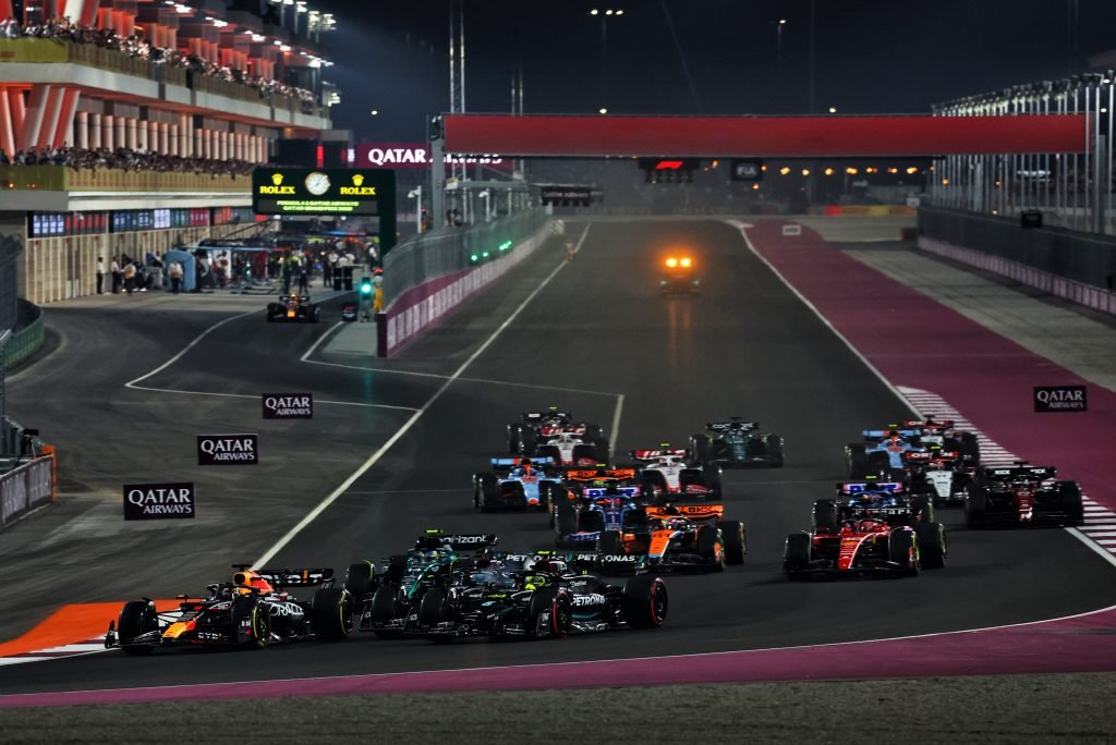 Max Verstappen (NLD) Red Bull Racing RB19 leads George Russell (GBR) Mercedes AMG F1 W14 and Lewis Hamilton (GBR) Mercedes AMG F1 W14, who collided at the start of the race.08.10.2023. Formula 1 World Championship, Rd 18, Qatar Grand Prix, Doha, Qatar, Race Day. - www.xpbimages.com, EMail: requests@xpbimages.com © Copyright: Coates / XPB Images