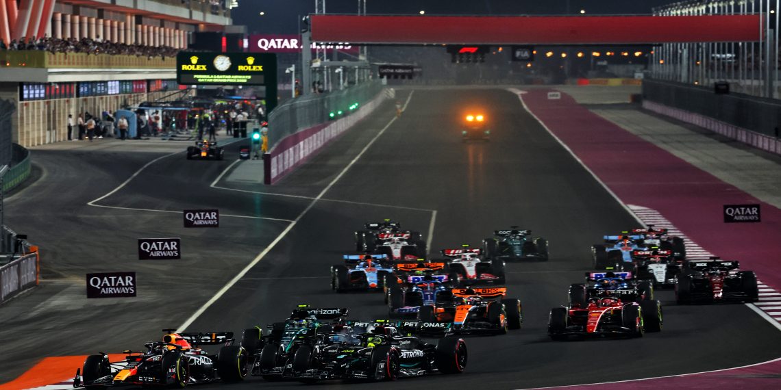 Max Verstappen (NLD) Red Bull Racing RB19 leads George Russell (GBR) Mercedes AMG F1 W14 and Lewis Hamilton (GBR) Mercedes AMG F1 W14, who collided at the start of the race. 08.10.2023. Formula 1 World Championship, Rd 18, Qatar Grand Prix, Doha, Qatar, Race Day. - www.xpbimages.com, EMail: requests@xpbimages.com © Copyright: Coates / XPB Images