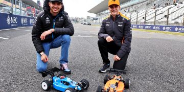 Esteban Ocon and Oscar Piastri with the radio controlled cars they raced today. Image: Moy / XPB Images