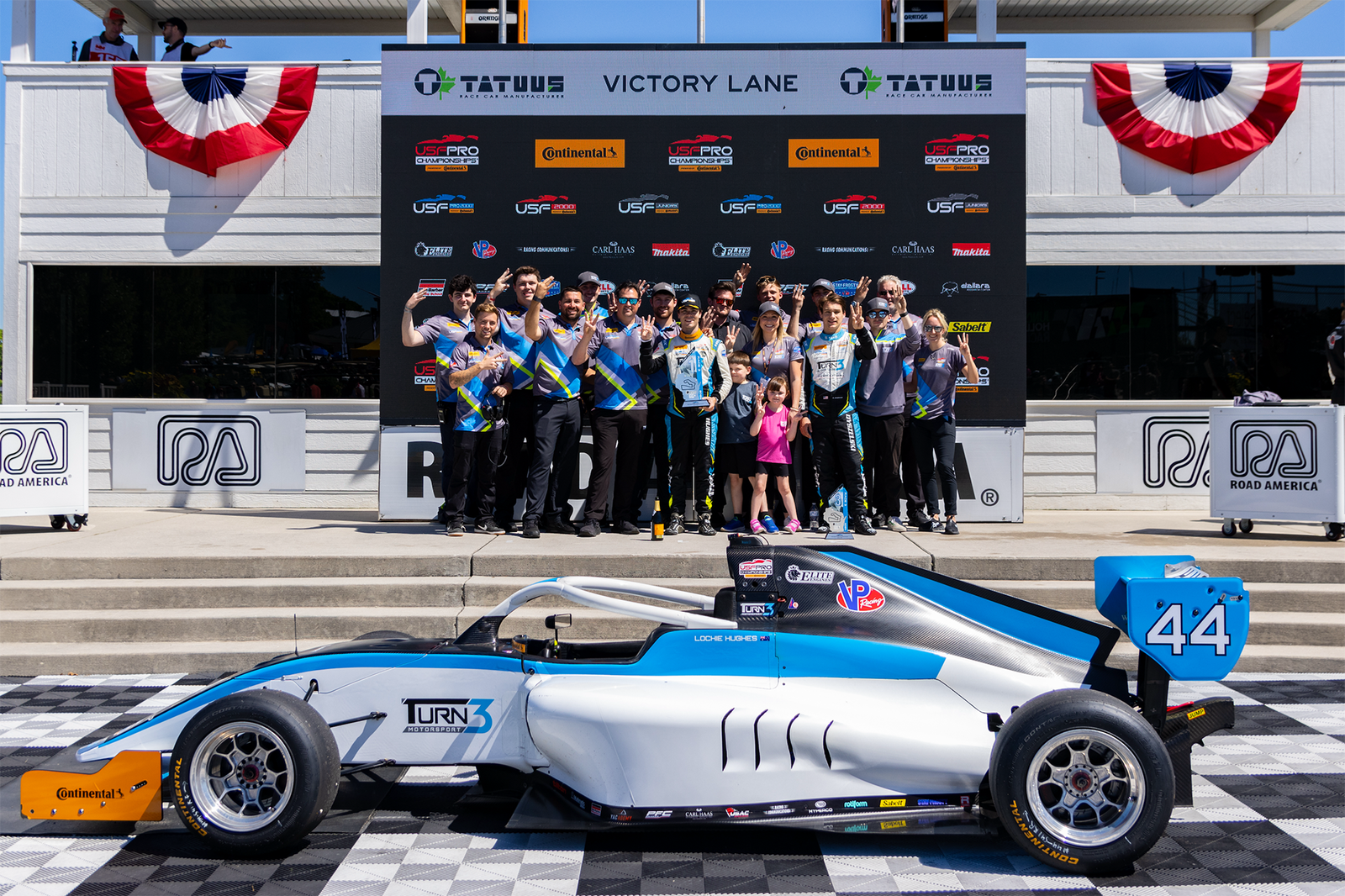 Lochie Hughes celebrates victory at Road America with his Turn 3 Motorsport squad.