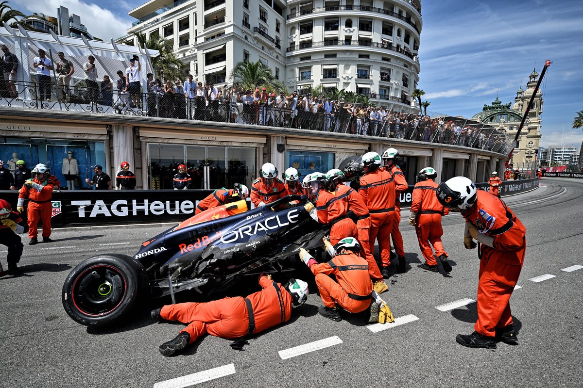 Sergio Perez believes dangerous driving from Kevin Magnussen caused his huge opening lap crash in the Monaco Grand Prix. Image: Price / XPB Images